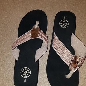 pink and black flip-flops